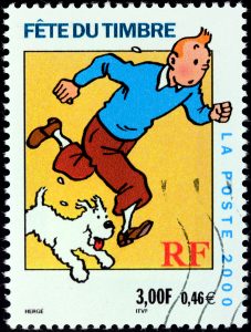 FRANCE - CIRCA 2000: A stamp printed by FRANCE shows image of cartoon character Tintin with his dog Snowy circa 2000